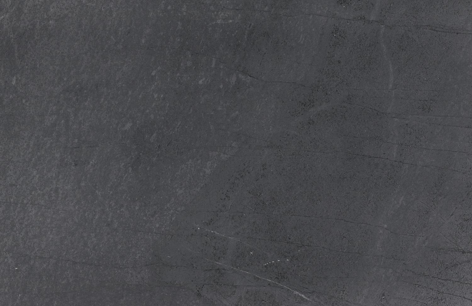 Soapstone Alberene countertops in a dark charcoal tone with soft texture, great for kitchen countertops. Soapstone by Granite Guy Inc.