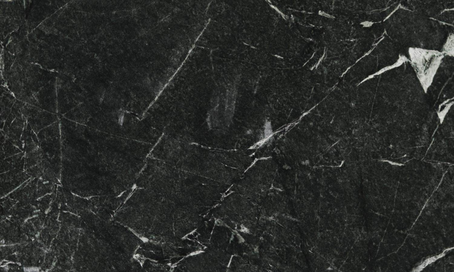 Soapstone Belvedere countertops with dark green-black base and bold white veining, perfect for kitchen countertops. Soapstone by Granite Guy Inc.