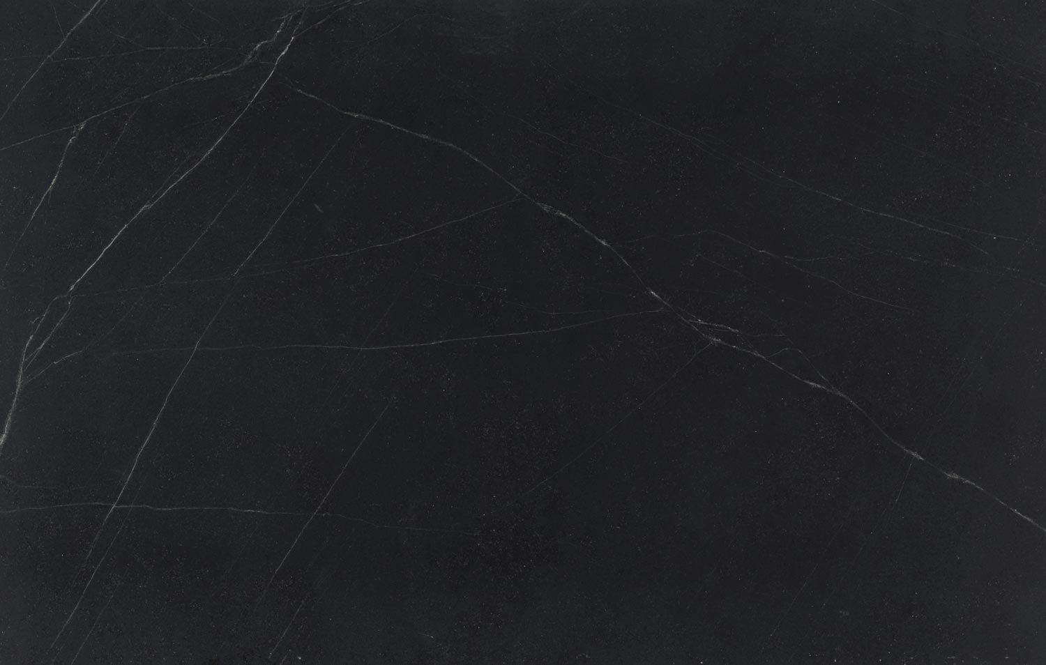 Soapstone Black countertops with soft white veining, ideal for kitchen countertops. Soapstone by Granite Guy Inc.