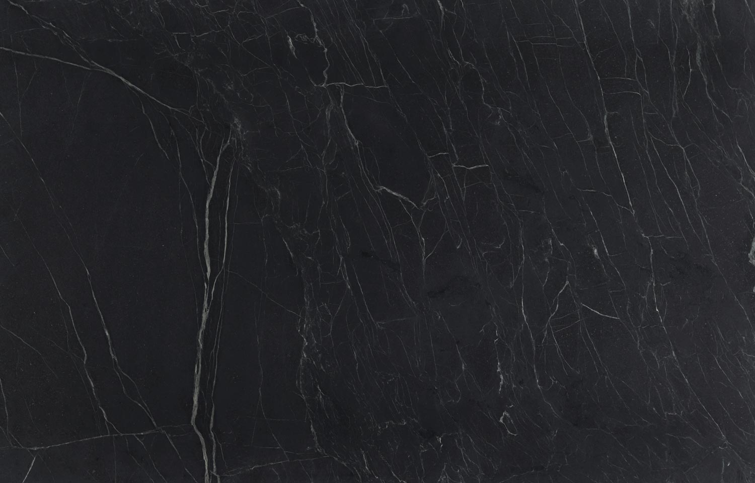 Soapstone Santa Rita countertops in a dark surface with elegant white veining, great for kitchen countertops. Soapstone by Granite Guy Inc.