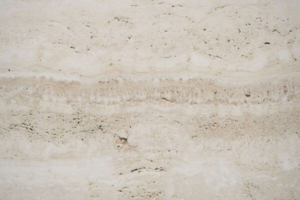 Travertine Alabastrino Vein Cut Unfilled countertops with creamy beige bands, great for kitchen countertops or vanities. Travertine by Granite Guy Inc.