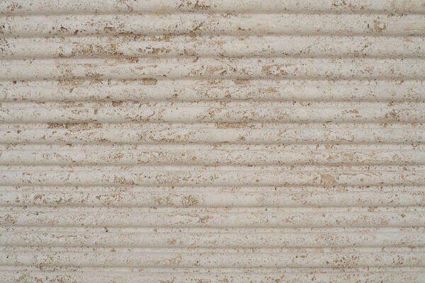 Travertine Classic Fluted Convex countertops with ribbed beige surface, great for kitchen countertops or accent walls. Travertine by Granite Guy Inc.