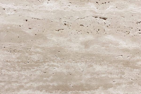 Travertine Classic Light countertops with soft beige tone and subtle white clouding, great for kitchen countertops. Travertine by Granite Guy Inc.