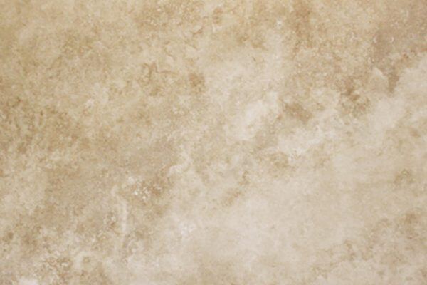 Travertine Ivory Honed countertops with smooth beige texture and subtle color shifts, ideal for kitchen countertops. Travertine by Granite Guy Inc.