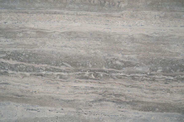 Travertine Ocean Blue countertops with soft gray and blue layers, great for kitchen countertops or showers. Travertine by Granite Guy Inc.