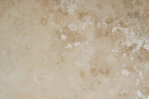 Travertine Osso countertops with creamy beige tone and soft movement, ideal for kitchen countertops or vanities. Travertine by Granite Guy Inc.