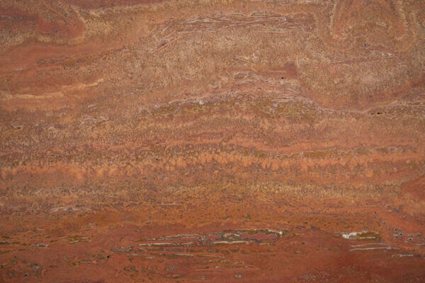 Travertine Red countertops with rich rust and copper layers, ideal for kitchen countertops or vanities. Travertine by Granite Guy Inc.