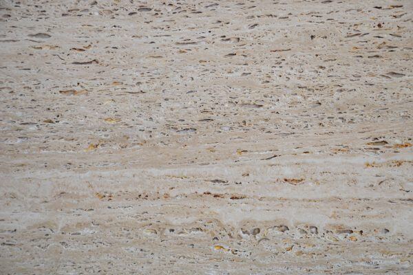 Travertine Santa Caterina Venato countertops with beige and golden veins, great for kitchen countertops or vanities. Travertine by Granite Guy Inc.