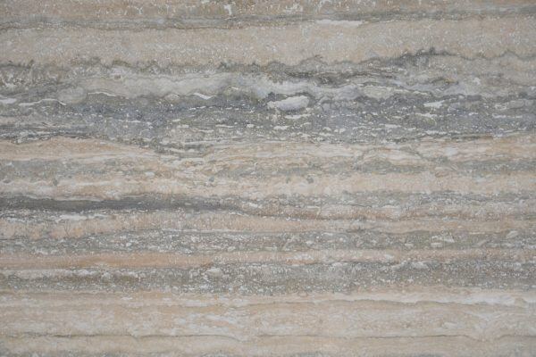 Travertine Silver Polished countertops with layered silver and beige tones, ideal for kitchen countertops or vanities. Travertine by Granite Guy Inc.