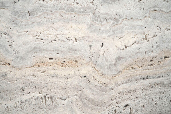 Travertine Stormy Grey countertops with layered gray and beige pattern, great for kitchen or bathroom countertops. Travertine by Granite Guy Inc.