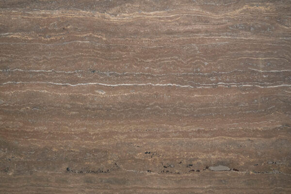 Travertine Titanium countertops with deep brown tones and layered texture for kitchen countertops or bar tops. Travertine by Granite Guy Inc.