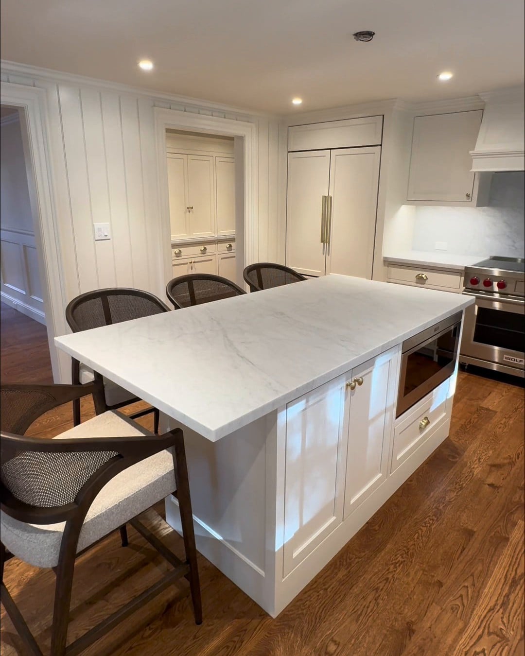 Honed White Carrara marble kitchen island countertop in a Massachusetts home