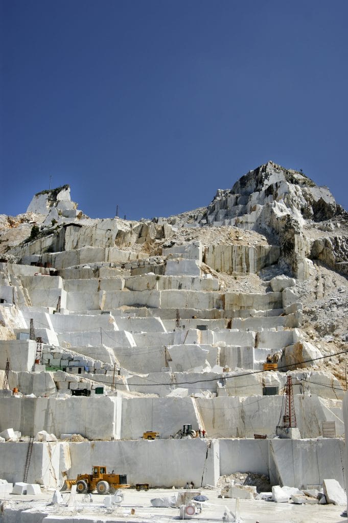 https://graniteguyinc.com/wp-content/uploads/2019/11/marble-quarry-in-carrara-white-italy-P2MVRR6-681x1024.jpg